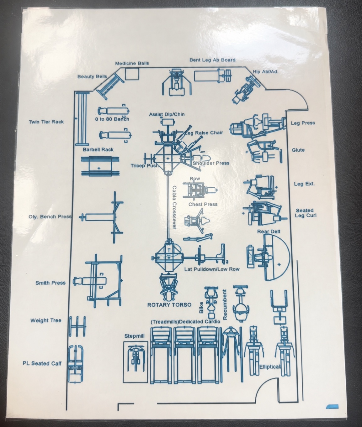 Gym floor plan with strength stations and cardio equipment distributed across a compact footprint.
